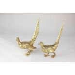 A pair of gilt painted metal models of pheasants, 26cm high