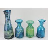 A collection of four various glass carafes or vases, probably Mdina, each with impressed seal to