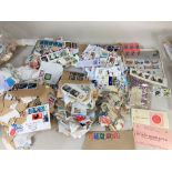 A large collection of loose used British and World 20th century stamps