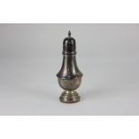 A silver sugar caster, of baluster form, Birmingham, 1930 (marks worn), weighted base