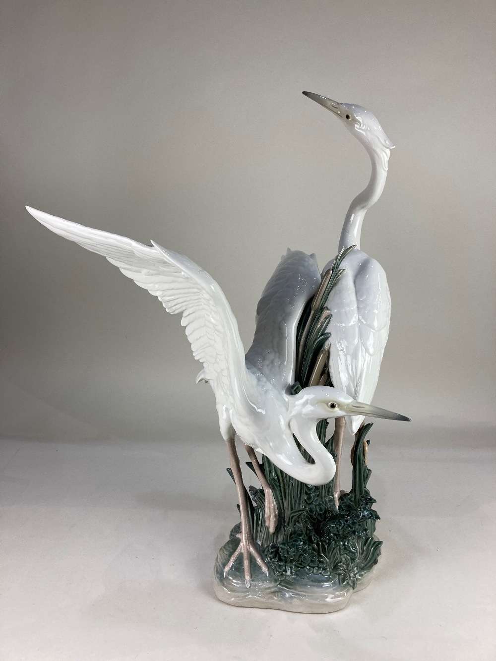 A large Lladro porcelain group, 'Dancing Herons', numbered 1319, 58cm high