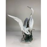 A large Lladro porcelain group, 'Dancing Herons', numbered 1319, 58cm high