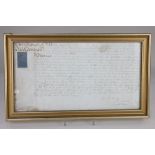 A framed 18th century vellum Baronial document, 20cm by 38cm (a/f)