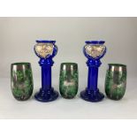 A pair of Victorian Bristol blue glass vases, with gilt and painted mistletoe design, together