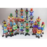 A collection of over twenty Murano glass figures of clowns, various shapes and sizes to include