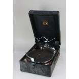 A 'His Master's Voice' black cased portable gramophone player, with winder