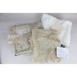 A finely worked lace shawl or veil, with paper note inscribed "Limerick lace. Once belonged to Queen