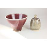 An Arabia Finland ceramic bowl, with sang de beouf style glaze, 18.5cm diameter, together with a