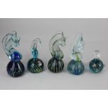 Four Mdina glass seahorse paperweights, tallest 17cm high, together with a similar paperweight in