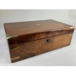 A 19th century brass mounted writing box, with ring top, interior slope and fittings not present (