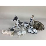 Three Royal Copenhagen porcelain models of animals, fox with cubs, a pair of rabbits and