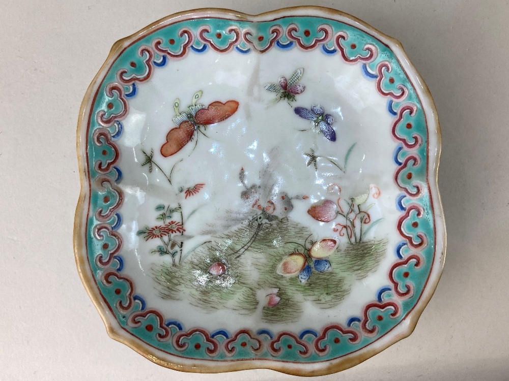 A small Chinese porcelain dish, with lobed rim, raised on a circular foot, decorated with - Image 2 of 3