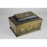 A Victorian black lacquered papier mâché jewellery box, decorated with an exotic bird, flowers,