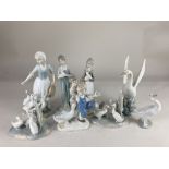 A Lladro porcelain model of a white goose, 12.5cm high, a Grafenthal model of a boy beside a