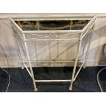 A white metal framed console table with shaped mirrored glass top, 87cm