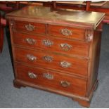 A George III mahogany bachelor's chest, the rectangular fold-over top above two short over three