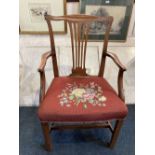 A George III carver dining chair with pierced back splat, tapestry seat on square chamfered legs