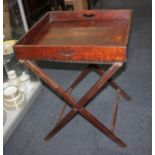 A Victorian rectangular wooden butlers tray on folding stand, 63cm and a bedroom tray top table with