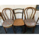 An Art Nouveau style bentwood dining chair the solid seat decorated with flowers and foliage and a