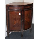 A continental mahogany and marquetry corner cabinet with spring action drawer and two cupboard doors