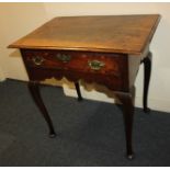 A George III oak side table, rectangular top with single drawer and fret cut frieze, on cabriole