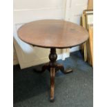 A George III mahogany circular occasional table on baluster stem and tripod base (a/f) 62cm