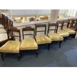 Six Regency style mahogany dining chairs, comprising three pairs, each with a rope twist back bar,