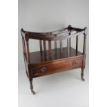 A 19th century mahogany two-section Canterbury magazine rack, with drawer to base, on turned legs to