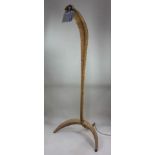 Tom Dixon, a wicker 'Cobra' floor lamp, designed 1993/4, 197cm high, provenance: purchased by the