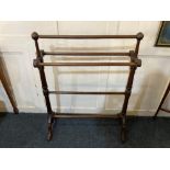 A Victorian mahogany towel rail with five hanging bars on fluted supports, 67cm