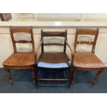 An early 19th century carver dining chair with rope twist bar back and solid seat and two single