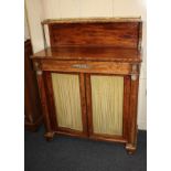 A Regency style mahogany chiffonier raised shelf back with brass gallery and supports, on