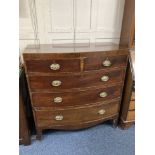 A 19th century mahogany bow front chest of two short over three long drawers with crossbanded top
