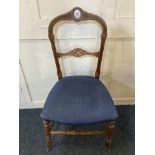 A Victorian drawing room chair with inlaid open bar back and top rail with oval Sevres style