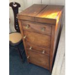 A George III mahogany wash stand with hinged top two cupboards and drawer, with boxwood and ebony