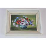 Norah Simpson, floral still life, anemones, oil on board, signed, paper label verso, 10cm by 14.5cm