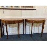 A pair of Sheraton style crossbanded mahogany demi lune side tables by Anthony Fortescue, each on