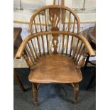 A Windsor armchair with ox bow stretcher