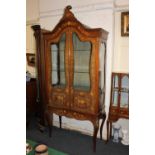 A late 19th/early 20th century Dutch floral marquetry display cabinet domed top with scroll