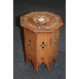 An Eastern inlaid octagonal side table, on pierced support (a/f - inlay missing) 32cm