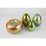 An Eva Zeisel for Zsolnay gold / green iridescent candle holder, of bulbous form, 11cm high,