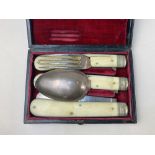 A late 19th / early 20th century set of silver plate and bone / ivory handled campaign set