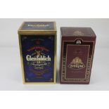 A Glenfiddich Ancient Reserve single malt scotch whiskey aged 18 years, in blue ceramic decanter