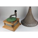 A horn gramophone, with 'N.P.S Co. Made in Germany Symphonista Universal' soundbox, the plinth