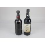 A bottle of Dows 1963 Vintage port, missing paper label, the top / seal embossed 'Dow 1963 Vintage',