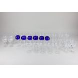 A collection of cut glass wine and other drinking glasses, to include a set of six blue and clear