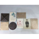 A First World War bronze death plaque, awarded to John Bertram Knight, in envelope and card outer,
