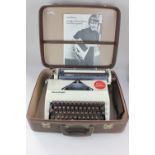 A Swedish Facit Privat typewriter, in cream with brown keys, in fitted brown case (a/f)