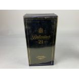A bottle of Ballantines Very Old Scotch Whiskey, aged 21 years in blue ceramic bottle and