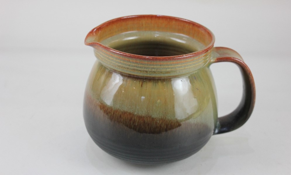 A Nanni Valentini for Ceramica Arcore ceramic pitcher, with brown glaze, marks and paper label to